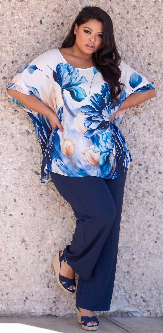 Conjunto floral con blusa amplia y pantalón palazzo