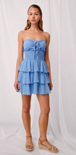 Vestido palabra de honor con volantes